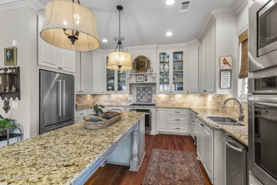 Beautiful waterfront home in the gated community of the Shores on Lake Caroline Golf Club in Mississippi - for sale on GolfHomes.com, golf home, golf lot