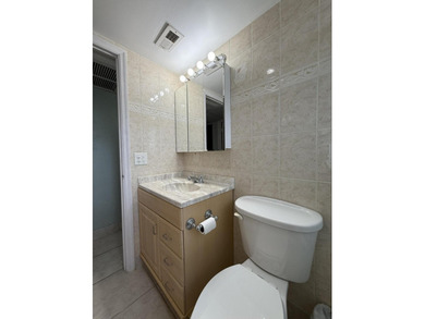 Ground floor 2 bedroom, 2 bath true corner unit with canal view on Addison Reserve in Florida - for sale on GolfHomes.com, golf home, golf lot