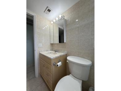 Ground floor 2 bedroom, 2 bath true corner unit with canal view on Addison Reserve in Florida - for sale on GolfHomes.com, golf home, golf lot