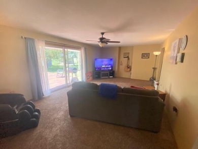 Take a look at this attractive ranch style home located adjacent on Split Rock Country Club in South Dakota - for sale on GolfHomes.com, golf home, golf lot