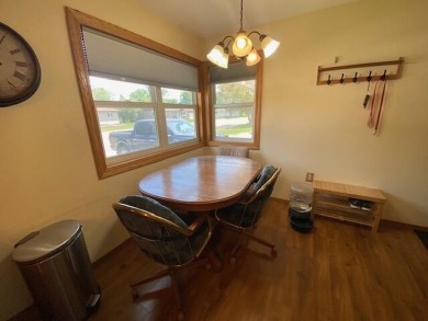 Take a look at this attractive ranch style home located adjacent on Split Rock Country Club in South Dakota - for sale on GolfHomes.com, golf home, golf lot
