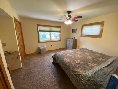 Take a look at this attractive ranch style home located adjacent on Split Rock Country Club in South Dakota - for sale on GolfHomes.com, golf home, golf lot