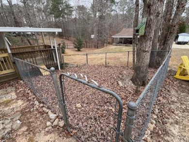 Excellent opportunity to own this double lot with a beautiful on River Golf and County Club at Lake Royale in North Carolina - for sale on GolfHomes.com, golf home, golf lot