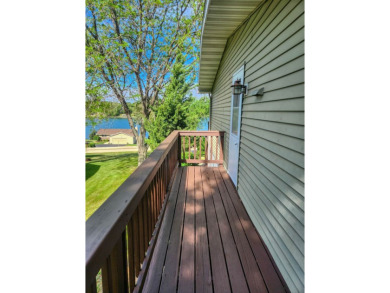 Welcome to your perfect retreat in the highly desirable Lake on Lake Carroll Golf Course in Illinois - for sale on GolfHomes.com, golf home, golf lot