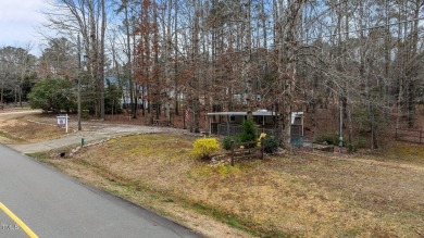 Excellent opportunity to own this double lot with a beautiful on River Golf and County Club at Lake Royale in North Carolina - for sale on GolfHomes.com, golf home, golf lot