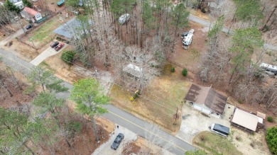 Excellent opportunity to own this double lot with a beautiful on River Golf and County Club at Lake Royale in North Carolina - for sale on GolfHomes.com, golf home, golf lot