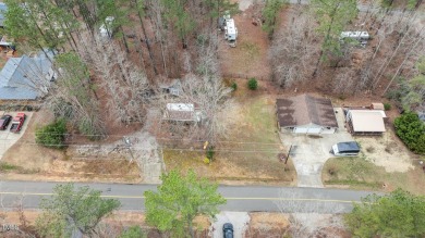 Excellent opportunity to own this double lot with a beautiful on River Golf and County Club at Lake Royale in North Carolina - for sale on GolfHomes.com, golf home, golf lot