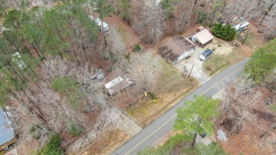 Excellent opportunity to own this double lot with a beautiful on River Golf and County Club at Lake Royale in North Carolina - for sale on GolfHomes.com, golf home, golf lot