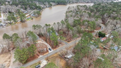 Excellent opportunity to own this double lot with a beautiful on River Golf and County Club at Lake Royale in North Carolina - for sale on GolfHomes.com, golf home, golf lot