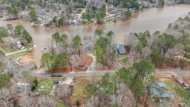 Excellent opportunity to own this double lot with a beautiful on River Golf and County Club at Lake Royale in North Carolina - for sale on GolfHomes.com, golf home, golf lot