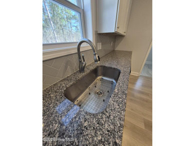 $12,000 PRICE IMPROVEMENT! Experience the charm of 125 on Seven Lakes Country Club in North Carolina - for sale on GolfHomes.com, golf home, golf lot