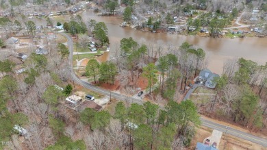 Excellent opportunity to own this double lot with a beautiful on River Golf and County Club at Lake Royale in North Carolina - for sale on GolfHomes.com, golf home, golf lot