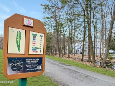 Tucked at the end of a quiet cul-de-sac and overlooking a on Paupack Hills Golf and Country Club in Pennsylvania - for sale on GolfHomes.com, golf home, golf lot