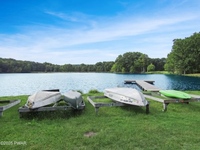 Tucked at the end of a quiet cul-de-sac and overlooking a on Paupack Hills Golf and Country Club in Pennsylvania - for sale on GolfHomes.com, golf home, golf lot