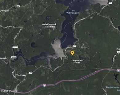 Tucked at the end of a quiet cul-de-sac and overlooking a on Paupack Hills Golf and Country Club in Pennsylvania - for sale on GolfHomes.com, golf home, golf lot