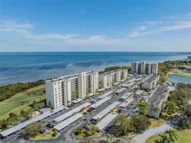 Breathtaking panoramic views of Tampa Bay and the lush fairways on Cove Cay Country Club in Florida - for sale on GolfHomes.com, golf home, golf lot