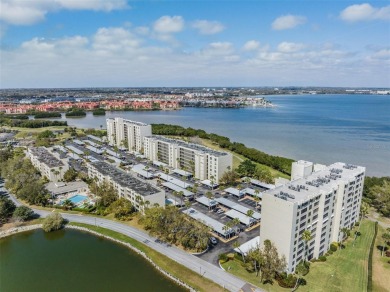 Breathtaking panoramic views of Tampa Bay and the lush fairways on Cove Cay Country Club in Florida - for sale on GolfHomes.com, golf home, golf lot
