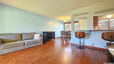 Charming 2-bedroom, 1.5-bath perimeter townhome that sits along on Pearl Country Club in Hawaii - for sale on GolfHomes.com, golf home, golf lot