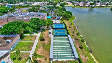 Step into luxury with this completely renovated 2-bed, 2-bath on Kings Point Golf -Flanders Way in Florida - for sale on GolfHomes.com, golf home, golf lot