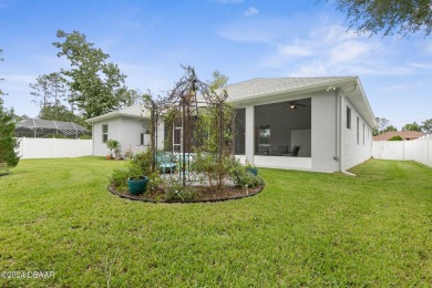 Welcome to your dream home in the sought after Cypress Knolls on The Grand Club Cypress Course in Florida - for sale on GolfHomes.com, golf home, golf lot