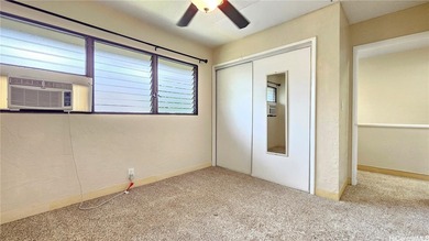 Charming 2-bedroom, 1.5-bath perimeter townhome that sits along on Pearl Country Club in Hawaii - for sale on GolfHomes.com, golf home, golf lot