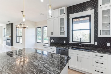 Welcome to 707 Broken Hills Drive, a stunning retreat in the on Ram Rock Golf Course in Texas - for sale on GolfHomes.com, golf home, golf lot