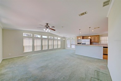 Welcome to your dream abode, nestled on a desirable corner lot on Brookridge Country Club in Florida - for sale on GolfHomes.com, golf home, golf lot