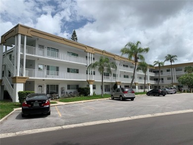 If you are looking for a 1st floor condo walking distance to the on On Top Of The World Golf Course in Florida - for sale on GolfHomes.com, golf home, golf lot