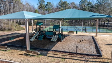 Welcome to this adorable 3-bedroom home in the highly on Hedingham Golf and Athletic Club in North Carolina - for sale on GolfHomes.com, golf home, golf lot