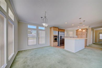 Welcome to your dream abode, nestled on a desirable corner lot on Brookridge Country Club in Florida - for sale on GolfHomes.com, golf home, golf lot