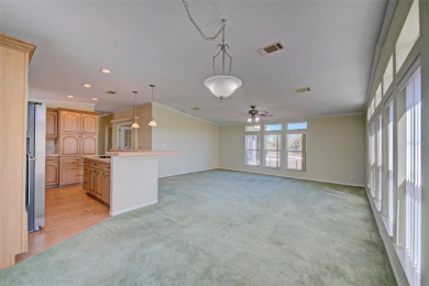 Welcome to your dream abode, nestled on a desirable corner lot on Brookridge Country Club in Florida - for sale on GolfHomes.com, golf home, golf lot