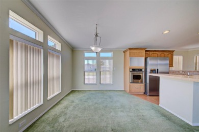 Welcome to your dream abode, nestled on a desirable corner lot on Brookridge Country Club in Florida - for sale on GolfHomes.com, golf home, golf lot