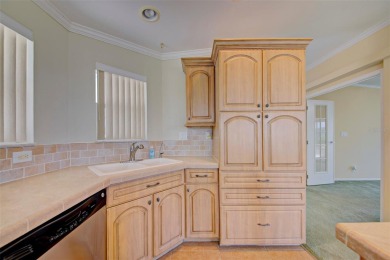 Welcome to your dream abode, nestled on a desirable corner lot on Brookridge Country Club in Florida - for sale on GolfHomes.com, golf home, golf lot