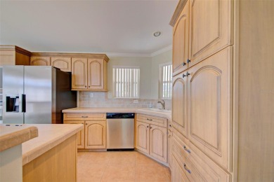 Welcome to your dream abode, nestled on a desirable corner lot on Brookridge Country Club in Florida - for sale on GolfHomes.com, golf home, golf lot