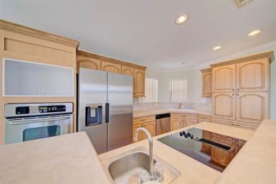 Welcome to your dream abode, nestled on a desirable corner lot on Brookridge Country Club in Florida - for sale on GolfHomes.com, golf home, golf lot