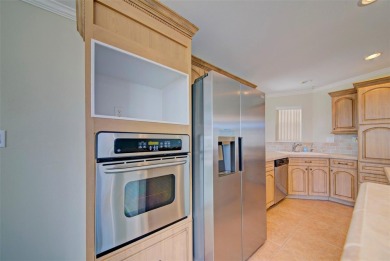 Welcome to your dream abode, nestled on a desirable corner lot on Brookridge Country Club in Florida - for sale on GolfHomes.com, golf home, golf lot
