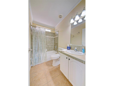 Welcome to your dream abode, nestled on a desirable corner lot on Brookridge Country Club in Florida - for sale on GolfHomes.com, golf home, golf lot