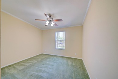 Welcome to your dream abode, nestled on a desirable corner lot on Brookridge Country Club in Florida - for sale on GolfHomes.com, golf home, golf lot