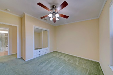 Welcome to your dream abode, nestled on a desirable corner lot on Brookridge Country Club in Florida - for sale on GolfHomes.com, golf home, golf lot