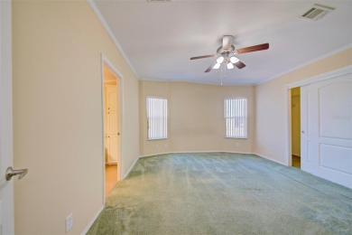 Welcome to your dream abode, nestled on a desirable corner lot on Brookridge Country Club in Florida - for sale on GolfHomes.com, golf home, golf lot