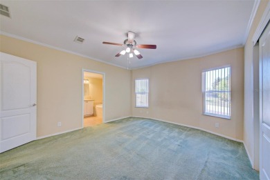 Welcome to your dream abode, nestled on a desirable corner lot on Brookridge Country Club in Florida - for sale on GolfHomes.com, golf home, golf lot