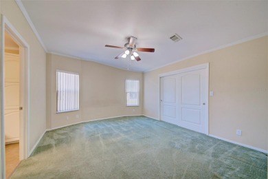 Welcome to your dream abode, nestled on a desirable corner lot on Brookridge Country Club in Florida - for sale on GolfHomes.com, golf home, golf lot