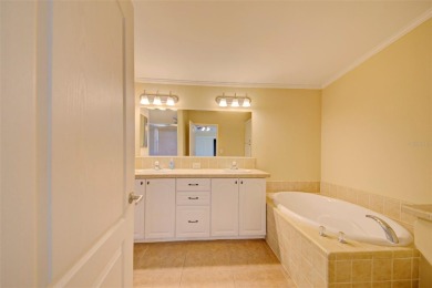 Welcome to your dream abode, nestled on a desirable corner lot on Brookridge Country Club in Florida - for sale on GolfHomes.com, golf home, golf lot