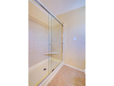 Welcome to your dream abode, nestled on a desirable corner lot on Brookridge Country Club in Florida - for sale on GolfHomes.com, golf home, golf lot