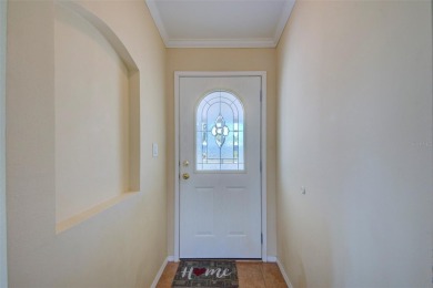 Welcome to your dream abode, nestled on a desirable corner lot on Brookridge Country Club in Florida - for sale on GolfHomes.com, golf home, golf lot