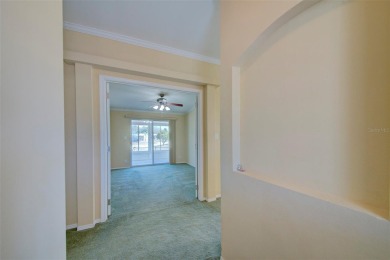 Welcome to your dream abode, nestled on a desirable corner lot on Brookridge Country Club in Florida - for sale on GolfHomes.com, golf home, golf lot
