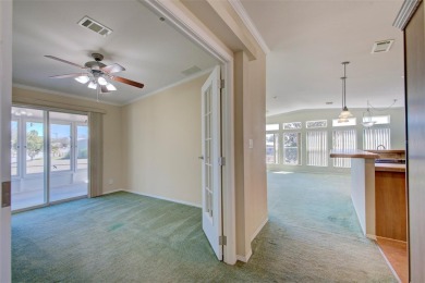 Welcome to your dream abode, nestled on a desirable corner lot on Brookridge Country Club in Florida - for sale on GolfHomes.com, golf home, golf lot