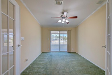 Welcome to your dream abode, nestled on a desirable corner lot on Brookridge Country Club in Florida - for sale on GolfHomes.com, golf home, golf lot