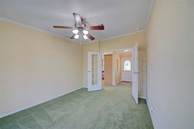 Welcome to your dream abode, nestled on a desirable corner lot on Brookridge Country Club in Florida - for sale on GolfHomes.com, golf home, golf lot