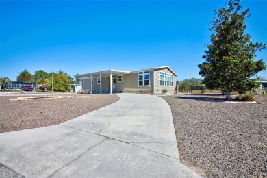 Welcome to your dream abode, nestled on a desirable corner lot on Brookridge Country Club in Florida - for sale on GolfHomes.com, golf home, golf lot